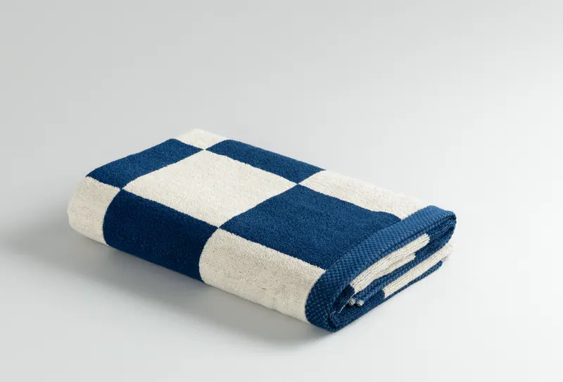 Check Navy towel, folded