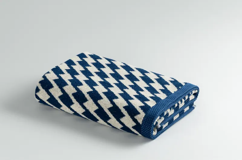 Harlequin Navy towel, folded