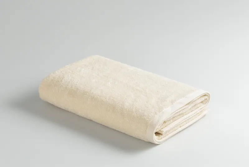 Plain Ivory towel, folded