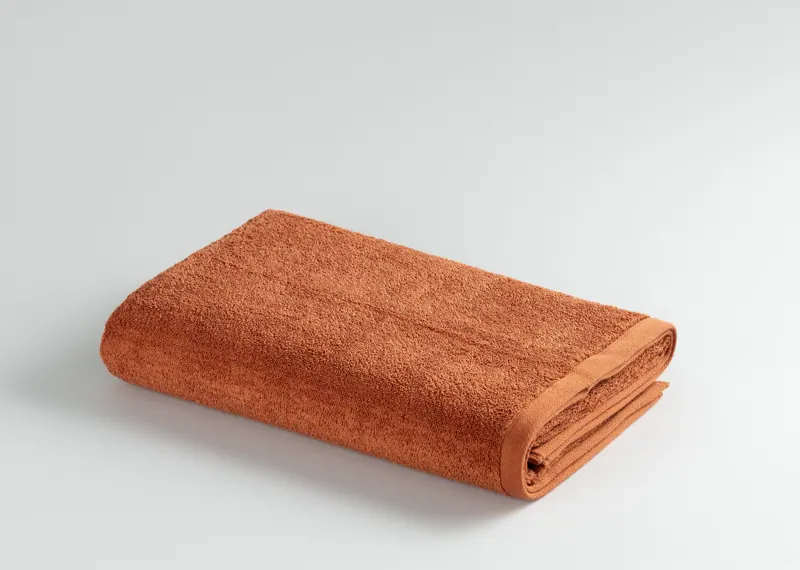 Plain Terracotta towel, folded