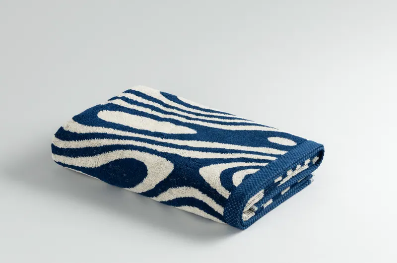 Swirl Navy towel, folded