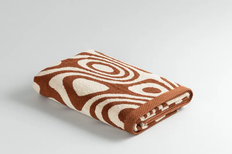 Swirl Terracotta towel, folded