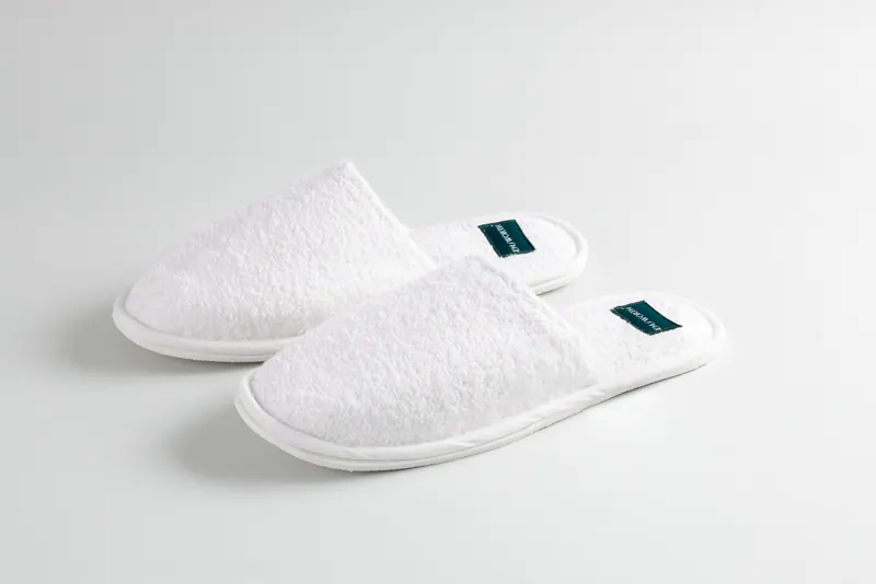 White terry slippers with Emsworth tag
